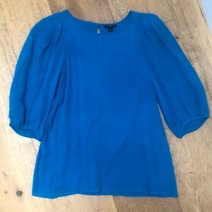 Turquoise/teal color 100% silk blouse with lining from Ann Taylor.